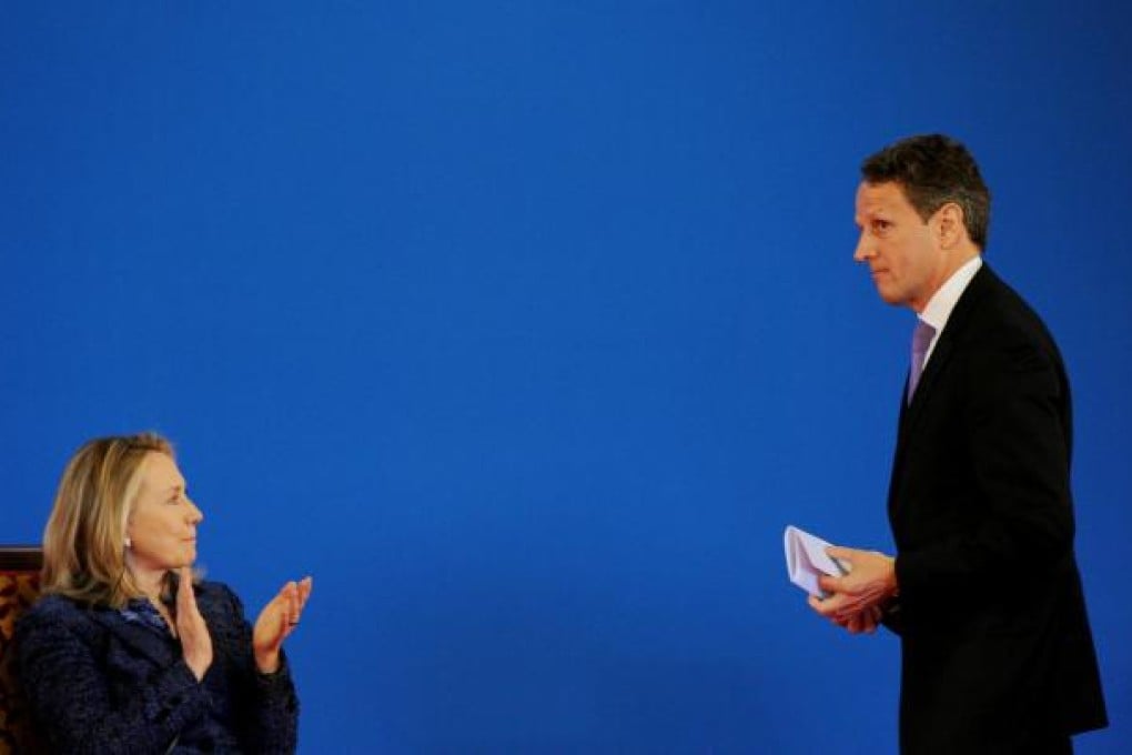 US Secretary of State Hillary Rodham Clinton applauds after Treasury Secretary Timothy Geithner addresses the US-China Strategic and Economic Dialogue in May. Photo: AFP