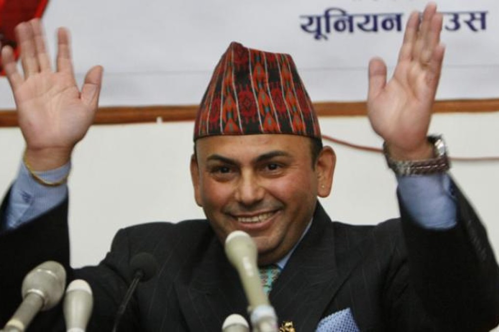 Govinda Prasad Mainali gestures during a press conference in Kathmandu on Wednesday. Photo: AP
