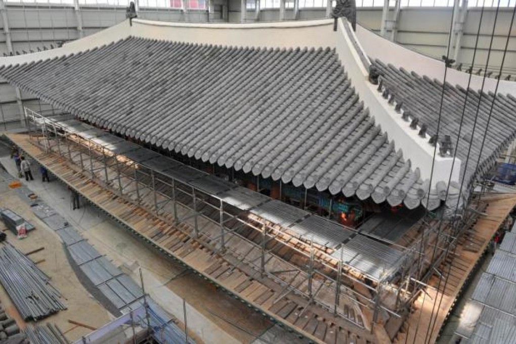 The structure's 22,000 roof tiles were handmade. Photo: AFP