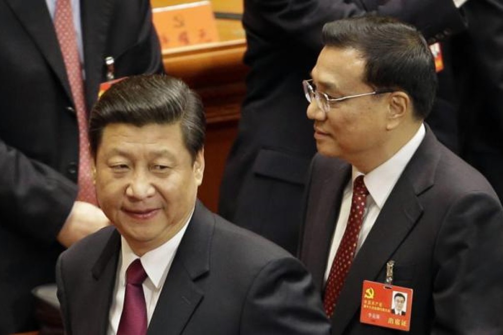 Xi Jinping (left) and Li Keqiang at the 18th party congress. Photo: AP