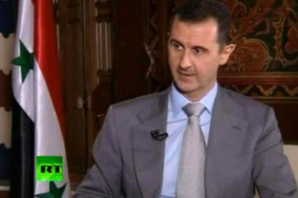 Syrian President Bashar Assad spoke with Russia Today and vowed to "live in Syria and die in Syria". Photo: AP