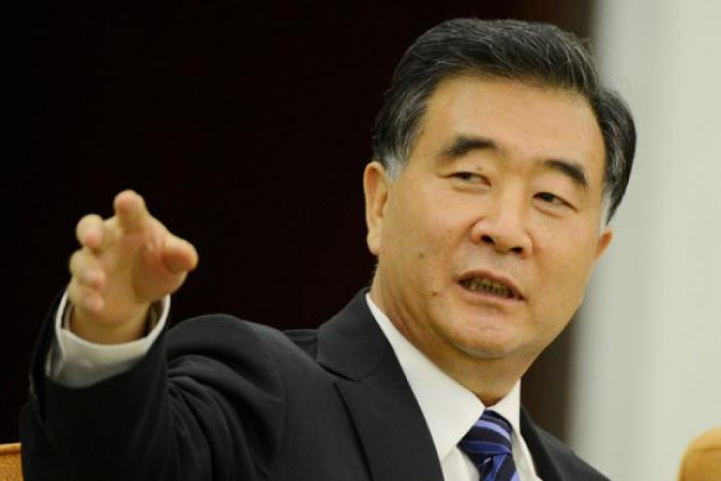 Communist Party Secretary of Guangdong Province, Wang Yang talks to the press at the Great Hall of the People in Beijing on Friday. Photo: AFP