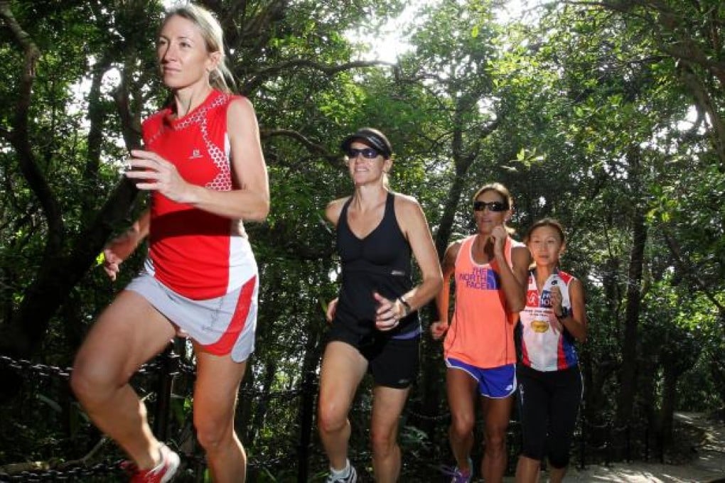 The Blister Sisters, Claire Price, Jeanette Holmes-Thomson, Kami Semick and Janet Ng, train for Friday's Trailwalker. Photo: May Tse