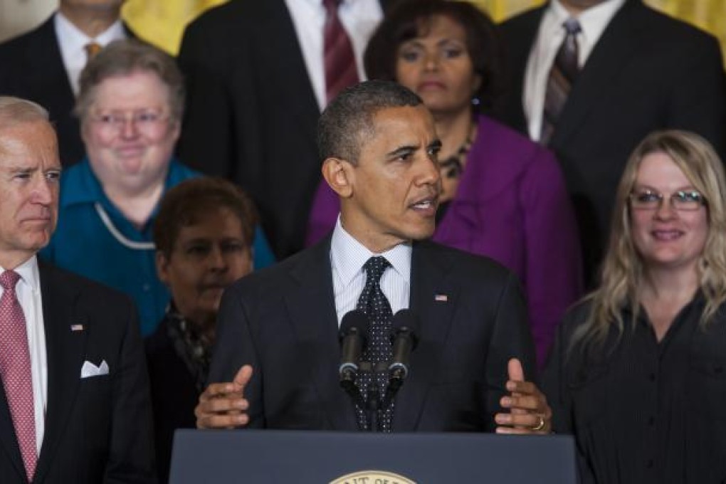 Barack Obama speaks to reporters about working with Congress to avoid the 'fiscal cliff' in the East Room of the White House, his first public appearance since his election night address. Photo: EPA