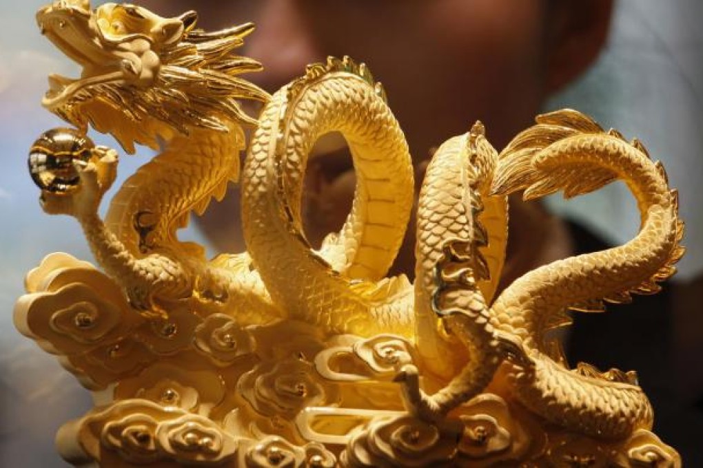 The Chinese dragon will overtake India as the world's biggest consumer of gold this year. Photo: Reuters