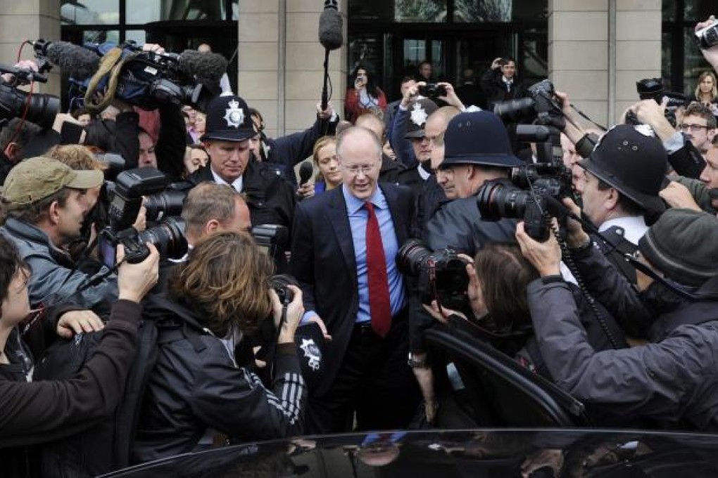 George Entwistle leaves Portcullis House, after his appearance before a parliamentary committee. His resignation makes his tenure as BBC director general the shortest in its 90-year history. Photo: EPA