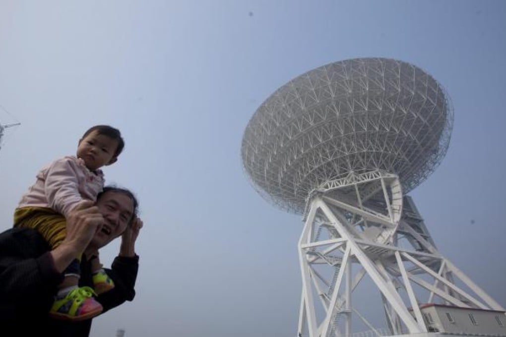 The 65-metre radio telescope erected at the foot of Sheshan Hill in Shanghai is reportedly the largest in Asia and the fourth biggest in the world. It is also, its critics point out, one of the closest to a densely populated area. Photo: EPA