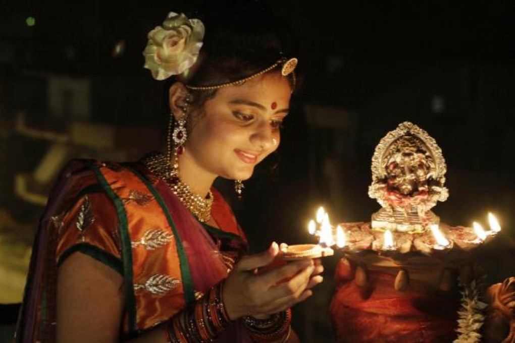 Hindus around the world celebrate Diwali, the festival of light. Photo: AP