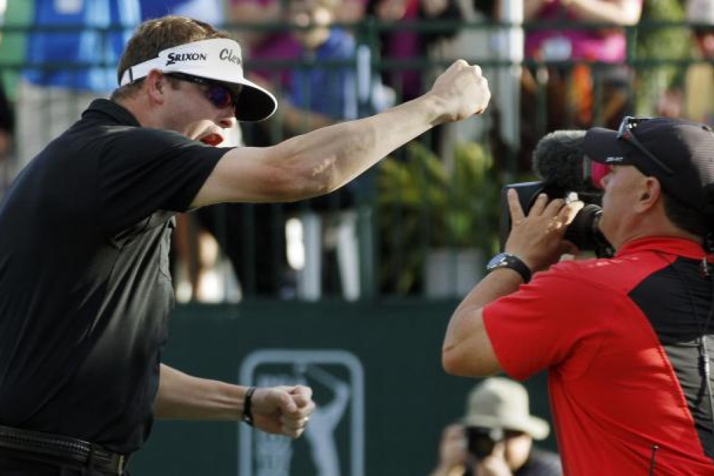 Charlie Beljan celebrates his win on the 18th green. Photo: AP