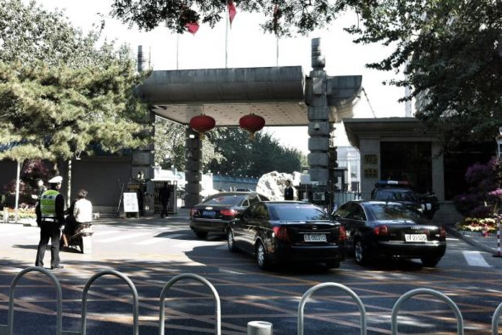 Black Audis, the vehicle of choice for senior party officials, drive up to the entrance of the Jingxi Hotel, in western Beijing. Photo: SCMP