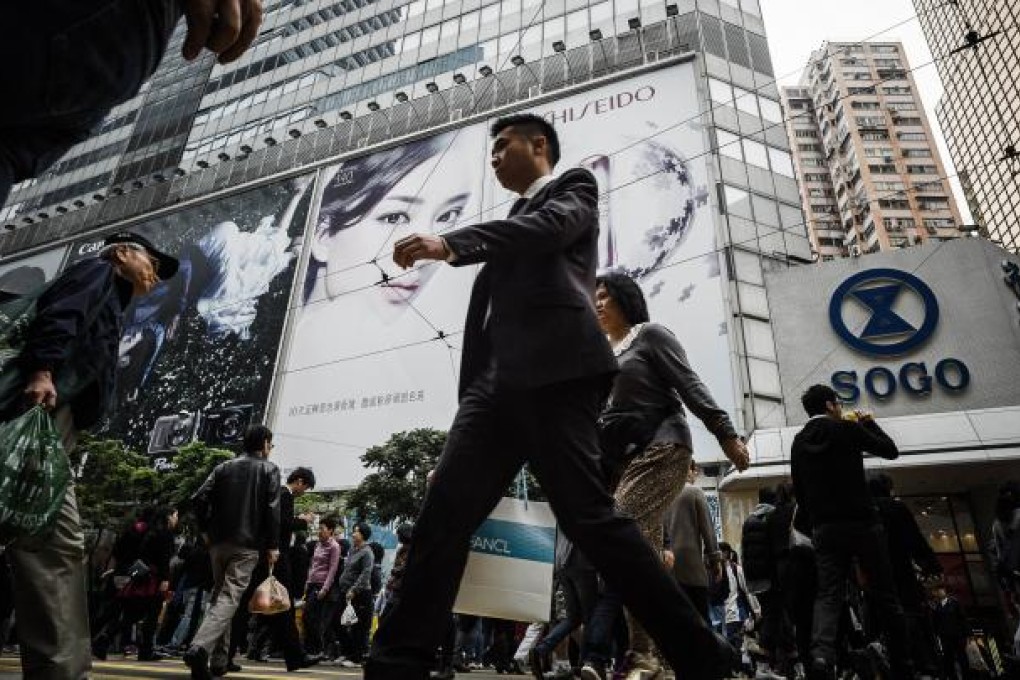 There is a large dollop of superiority, but also self-assuredness, pride and boastfulness amongst Hongkongers. Photo: AFP