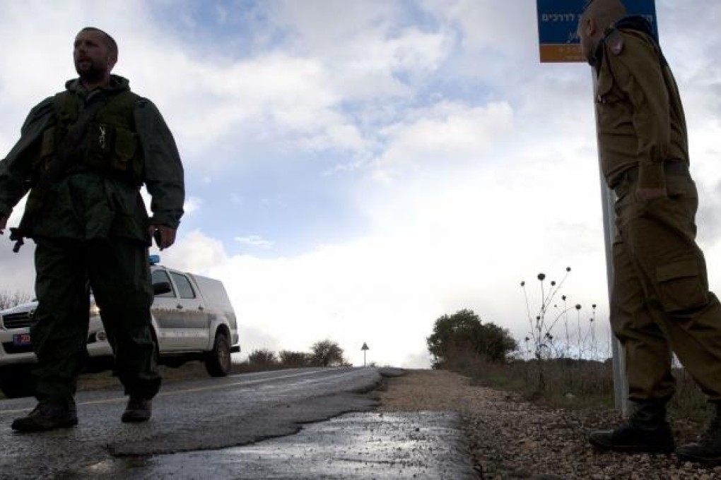 Israeli soldiers stand guard in Alonei Habashan in the Israeli-occupied Golan Heights. Photo: AFP