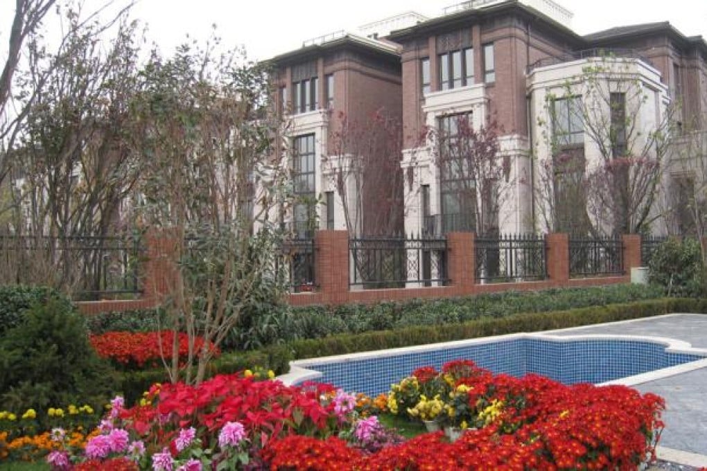 A luxury residential project owned by China Overseas Land & Investment, which directors were top insider sellers in terms of value.