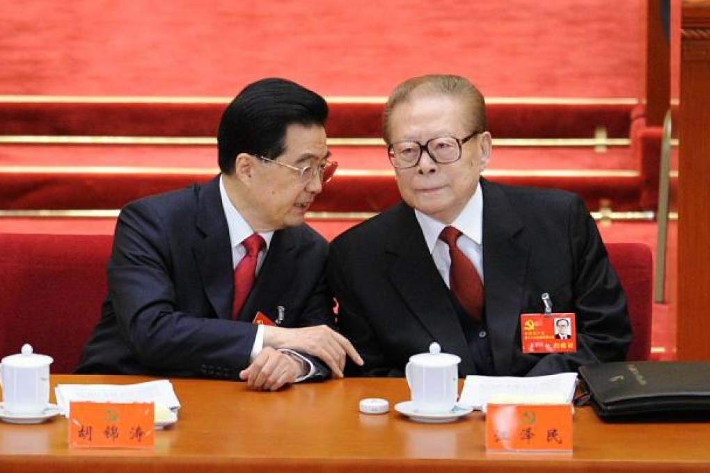 Crafty elder Jiang (right) outwits Hu yet again. Photo: Xinhua