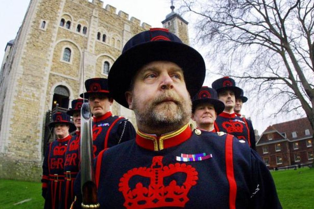 Beefeaters, the Tower of London's traditional custodians, have outsourced some of their duties to a private security firm. Photo: AFP