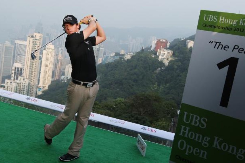 World No 1 Rory McIlroy gets in the swing on The Peak yesterday ahead of his Hong Kong Open title defence. Photo: Sam Tsang