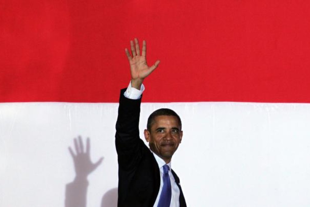 US President Barack Obama waves goodbye after delivering a speech at the University of Indonesia in Jakarta during a 2010 trip to the country. Photo: EPA