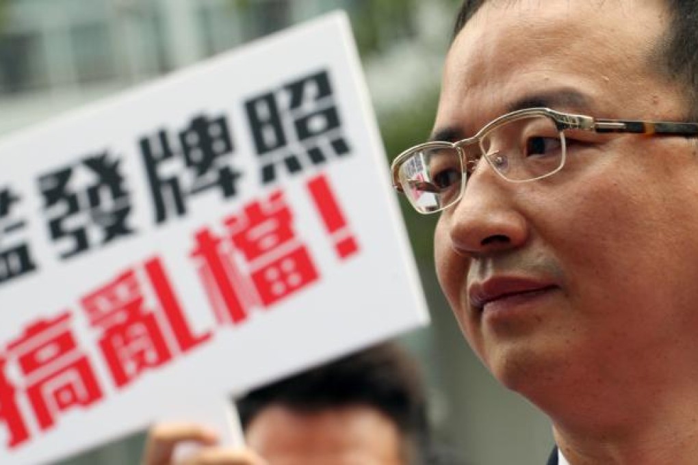ATV major shareholder Wang Zheng is seen during ATV hosts a symposium on outlook for free television in Hong Kong at the Central Government Offices.