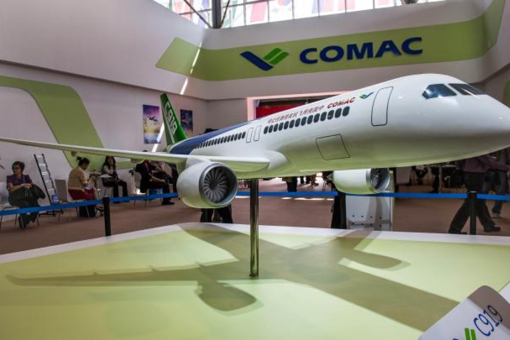 A model of the Comac C919 passenger jet is displayed during the 9th China International Aviation and Aerospace Exhibition in Zhuhai on November 13, 2012. Photo: AFP