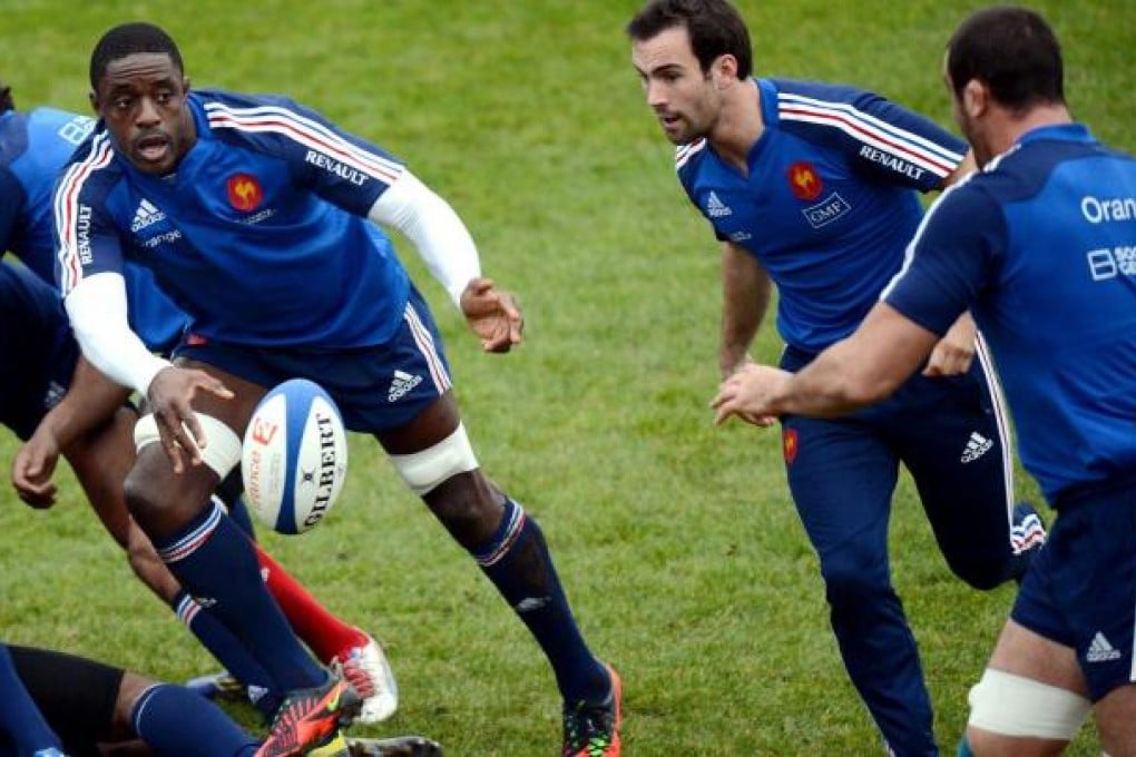 France flanker Yannick Nyanga passes the ball to a teammate during training ahead of Saturday's match against England. Photo: AFP