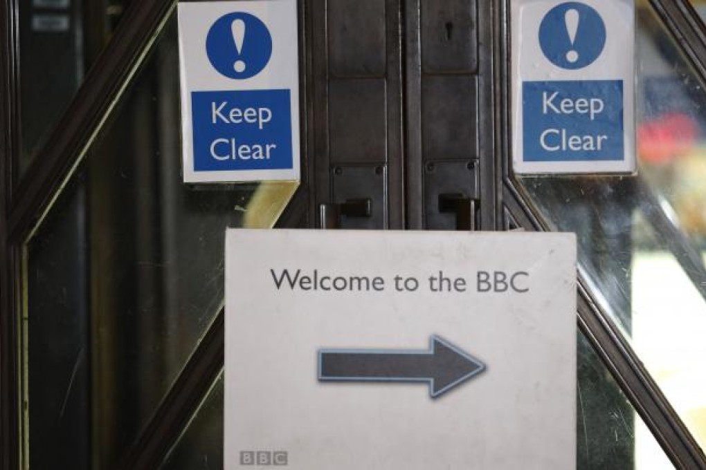 Contradictory signs at the BBC New Broadcasting House in London suggest that the crisis-hit corporation may have lost its direction, temporarily at least, following the airing of false child sex abuse claims against a former politician. Photo: Reuters