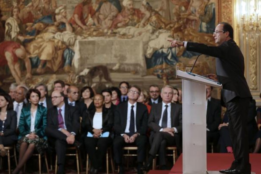 President Hollande shares his ideas with the press. Photo: AFP