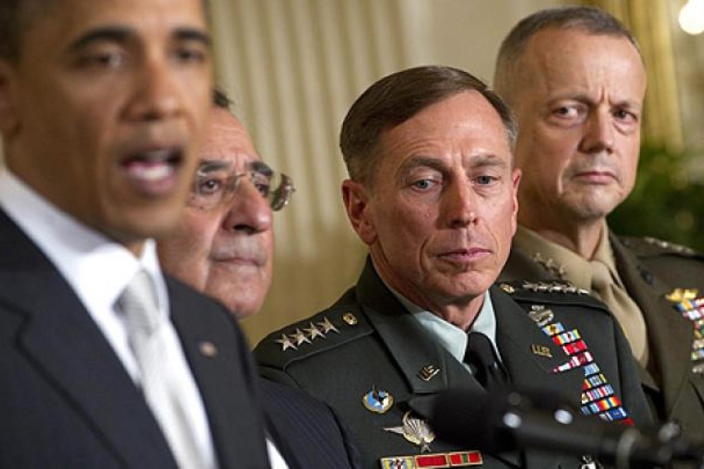 (From left) US President Barack Obama, Defence Secretary Leon Panetta, General David Petraeus and General John Allen in April. Photo: AFP