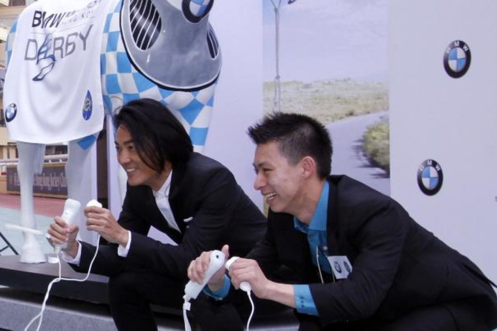 Ekin Cheng (left) and jockey Matthew Chadwick. Photo: SCMP