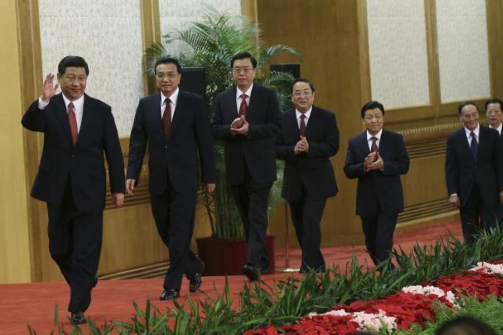 The new Politburo Standing Committee members - Xi Jinping (left), Li Keqiang, Zhang Dejiang, Yu Zhengsheng, Liu Yunshan, Wang Qishan and Zhang Gaoli - arrive. Photo: Reuters