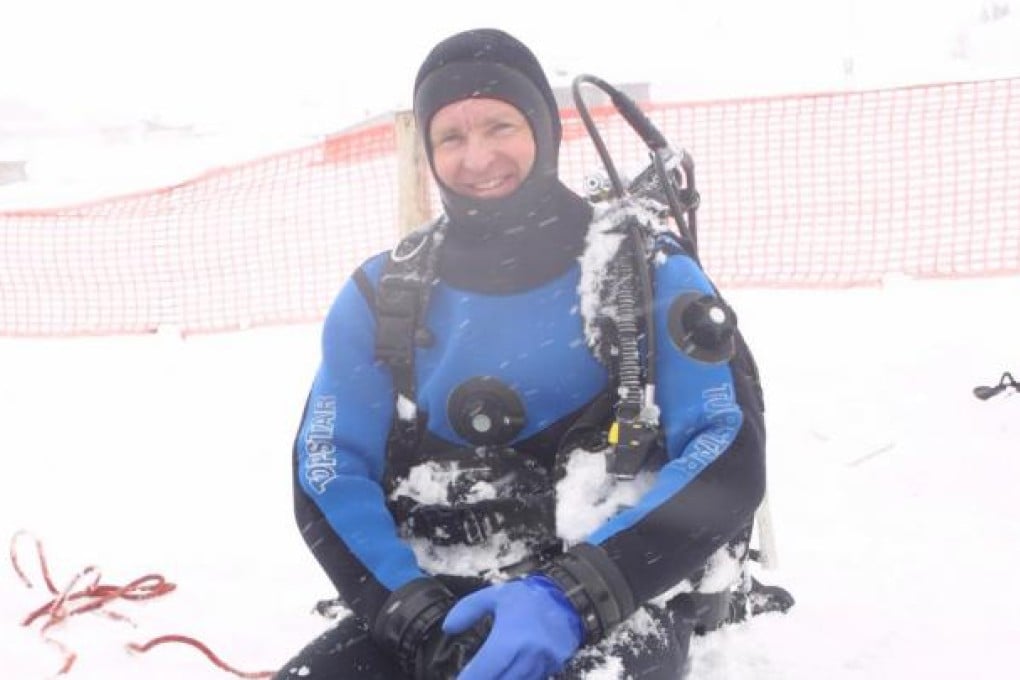 Alf Alderson prepares to dive. Photos: Alf Alderson, AFP