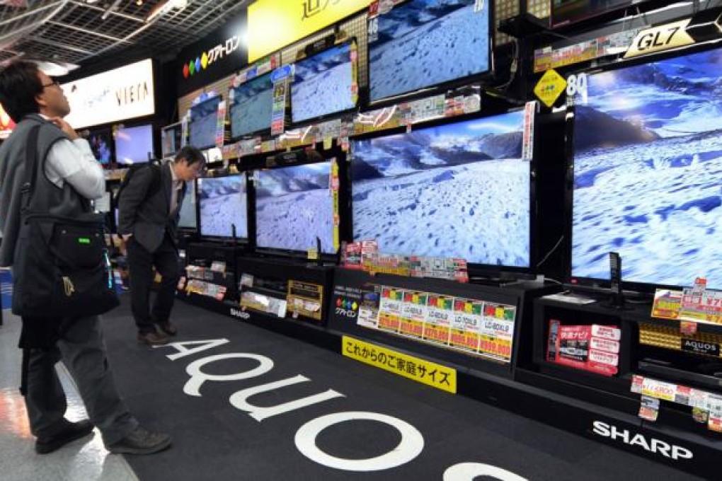 Sharp shares jumped on a reported Intel stake sale.