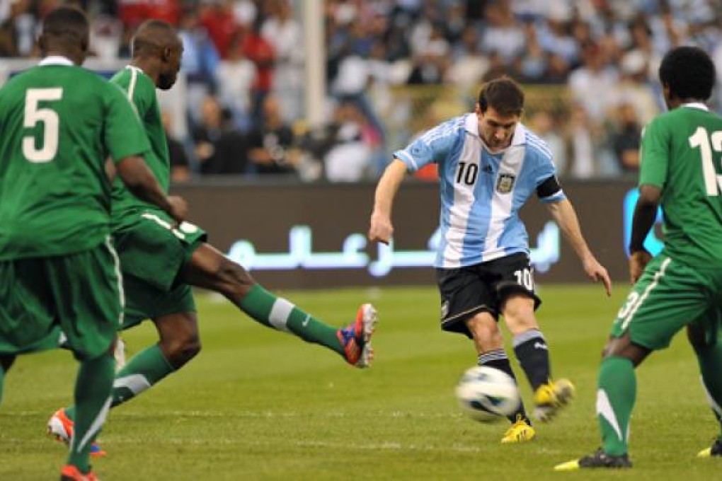Argentina's Lionel Messi, shows off his skills in a friendly against Saudi Arabia on Wednesday. The match ended in a goalless draw, which meant Messi had failed in his bid to set an outright record for the most Argentina goals in a calendar year. Photo: AFP