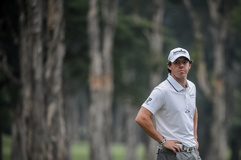 A frustrated Rory McIlroy reflects on a disappointing first day at the UBS Hong Kong Open on Thursday. Photo: AFP