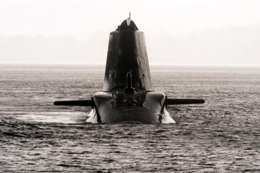 HMS Astute, the British Royal Navy's latest nuclear submarine, sails up the Firth of Clyde to its base in western Scotland. Photo: AFP