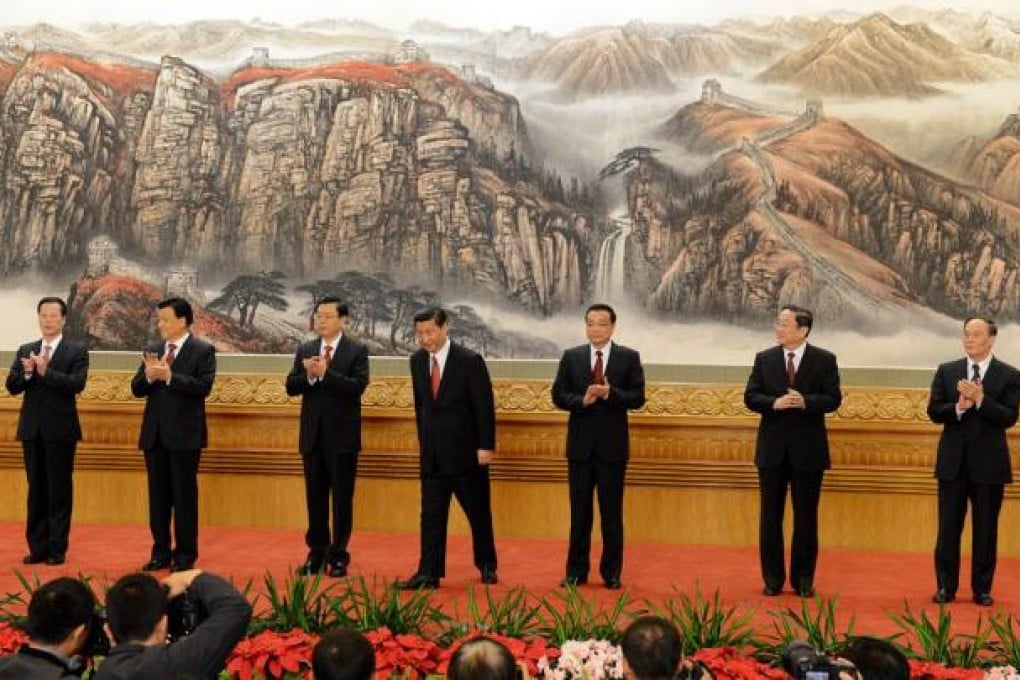 The new Politburo Standing Committee members (from left) Zhang Gaoli, Liu Yunshan, Zhang Dejiang, Xi Jinping, Li Keqiang, Yu Zhengsheng and Wang Qishan in the Great Hall of the People. Photo: AFP