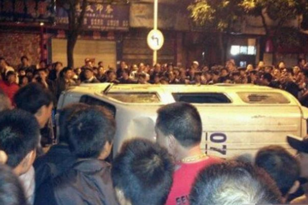 A photo circulated on Sina Weibo is said to show a van overturned during the riot in Fuan city on Saturday night. Photo: SCMP