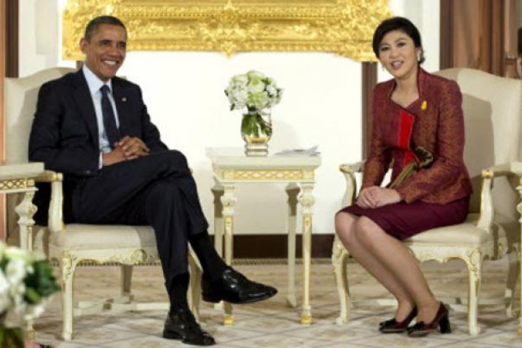 US President Barack Obama, left, and Thai Prime Minister Yingluck Shinawatra meet at Government House in Bangkok on Sunday. Photo: AP