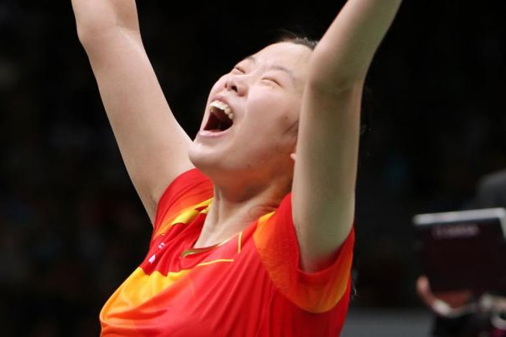 Li Xuerui celebrates her victory in the London Olympic Games final against compatriot Wang Yihan. Photo: Felix Wong