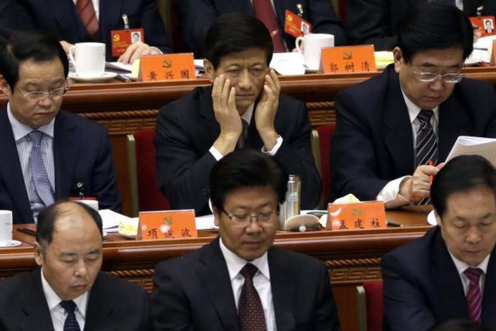 The appointment of Meng Jianzhu (top centre) as new security tsar has been welcomed by many as signalling the downgrading of the Communist Party's Political and Legal Affairs Commission. Photo: AP