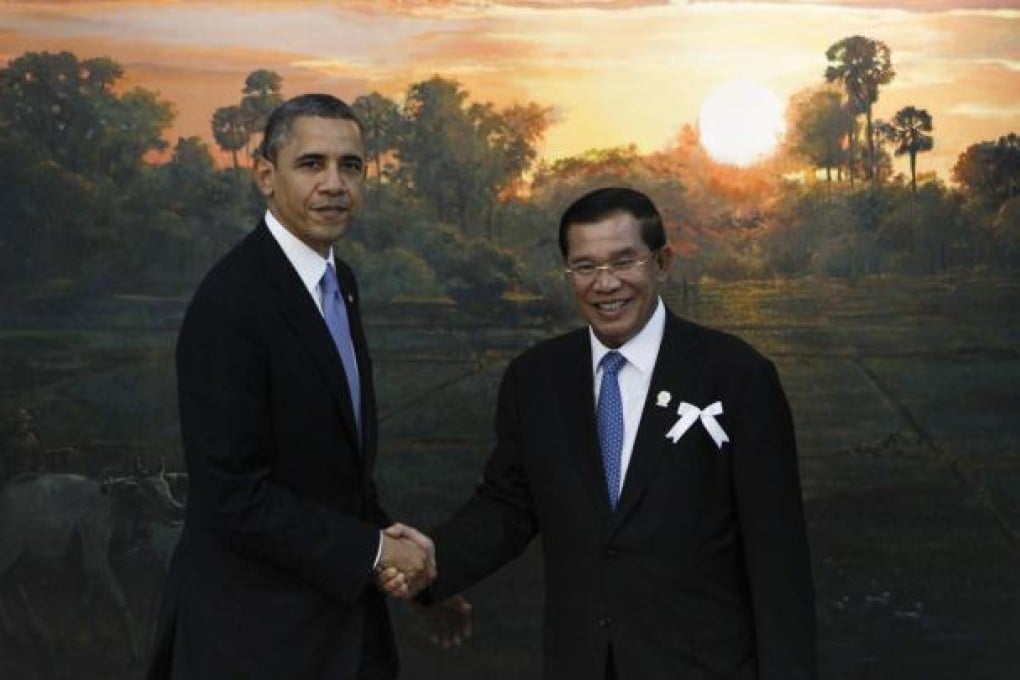Hun Sen (right) with Barack Obama. Photo: AP