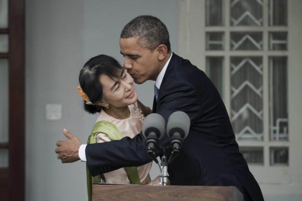 US President Barack Obama embraces Aung San Suu Kyi at her residence in Yangon. Photo: AFP