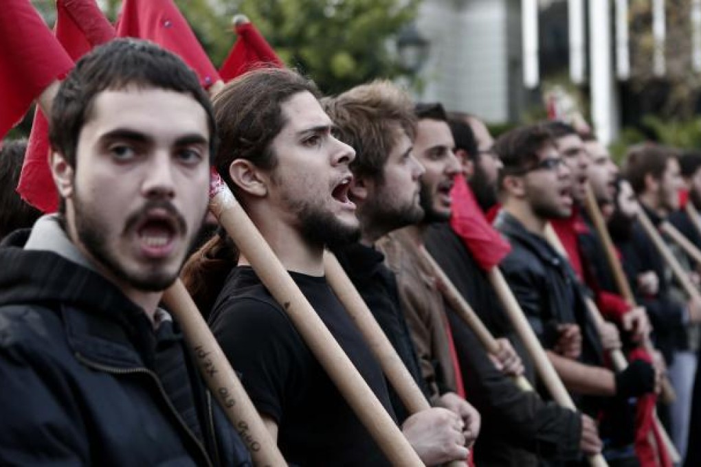 Greek students at a peaceful march in Athens. Photo: Reuters