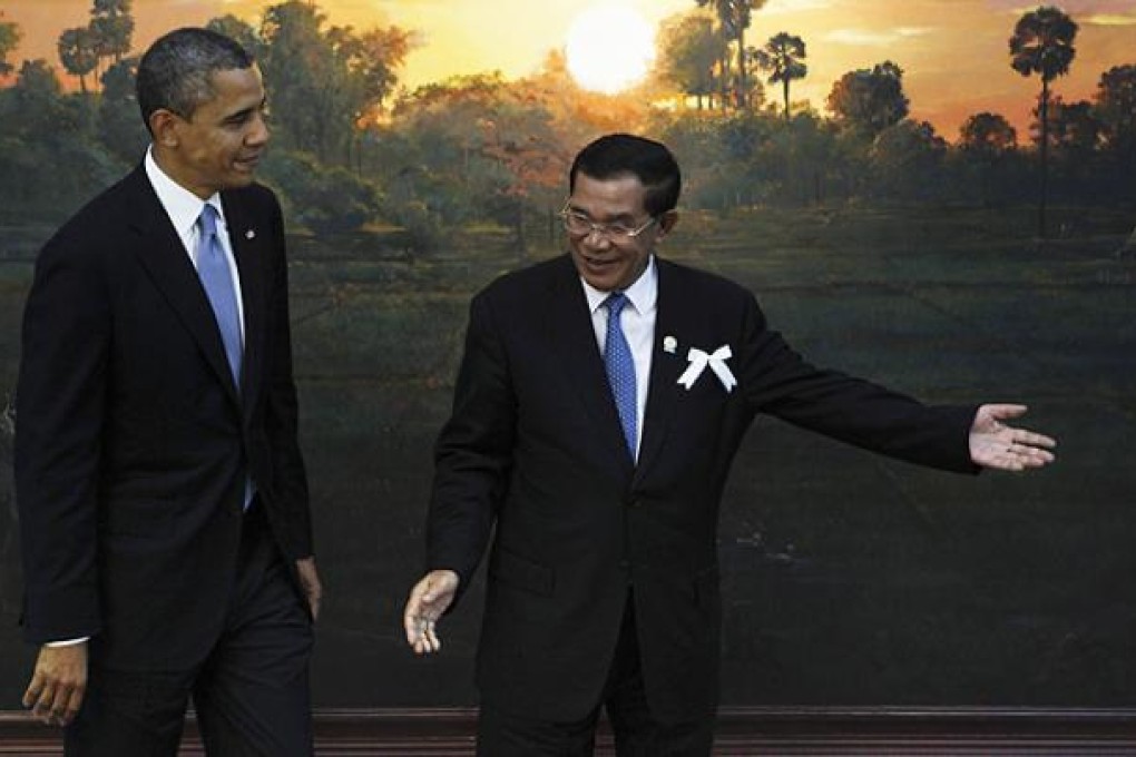 Cambodia's Prime Minister Hun Sen greets US President Barack Obama ahead of the Asean-US leaders meeting in Phnom Penh on Monday. Photo: AP