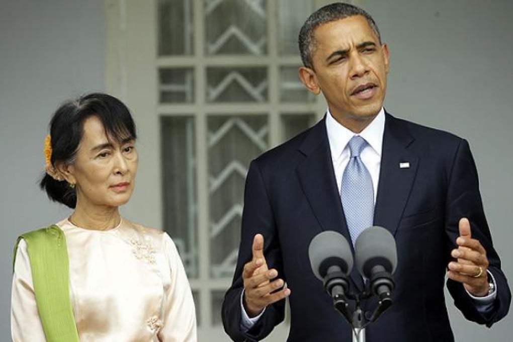 US President Barack Obama meets with Myanmar opposition leader Aung San Suu Kyi at her residence in Yangon on Monday. Photo: AP