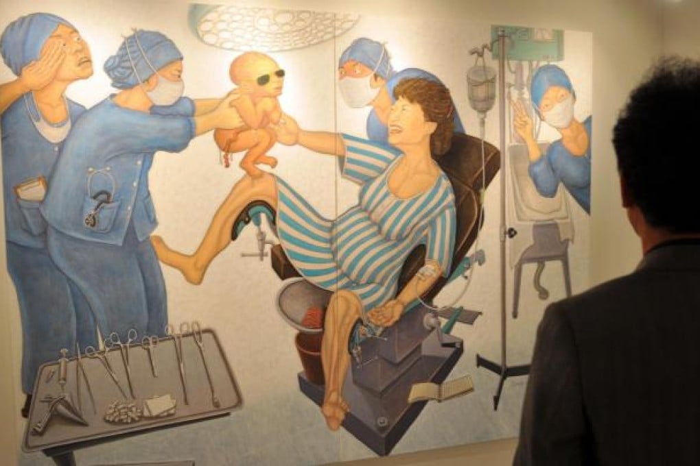 Hong Sung-dam's satirical painting is being shown as part of a show in Seoul on ex-dictator Park Chung-hee's military rule. Photo: AFP