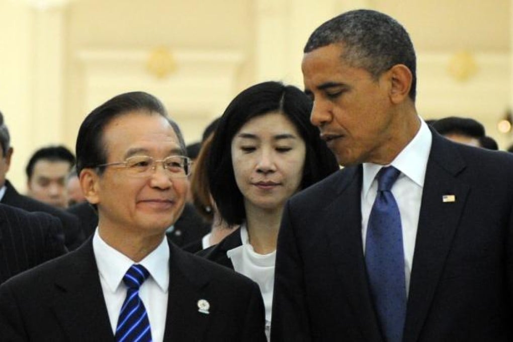 US President Barack Obama (right) talks to Chinese Premier Wen Jiabao at the East Asia Summit in Phnom Penh. With domestic politics now out the way, China and the US have shifted their attention back to the Asean geopolitical chessboard. Photo: AFP