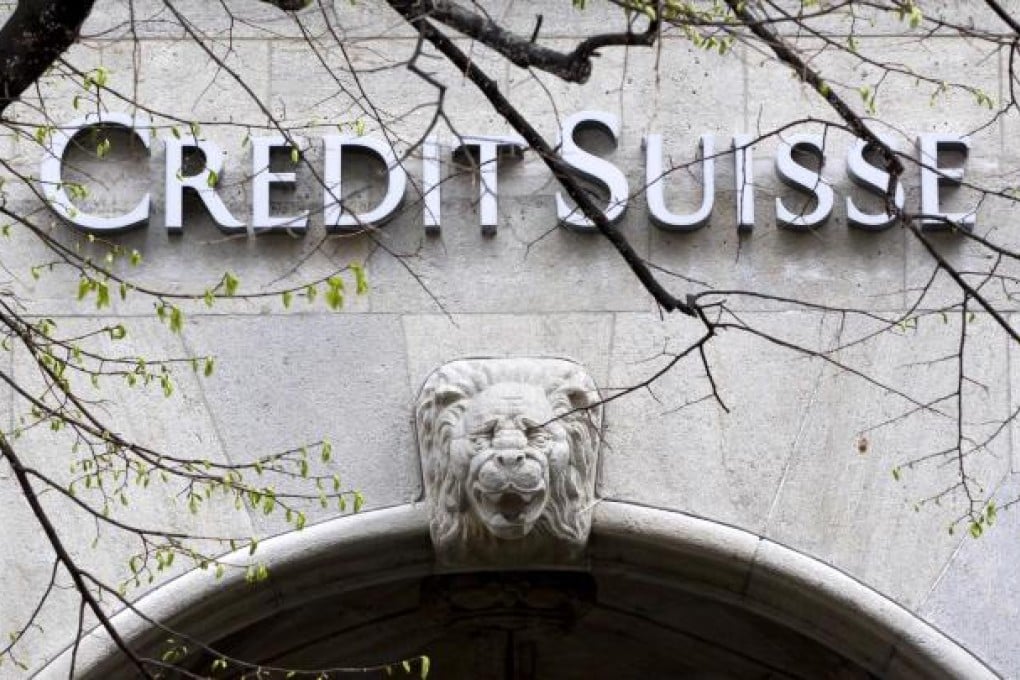 The logo of Swiss bank Credit Suisse is photographed at a building in Zurich, Switzerland.  (AP Photo/Keystone/Alessandro Della Bella)
