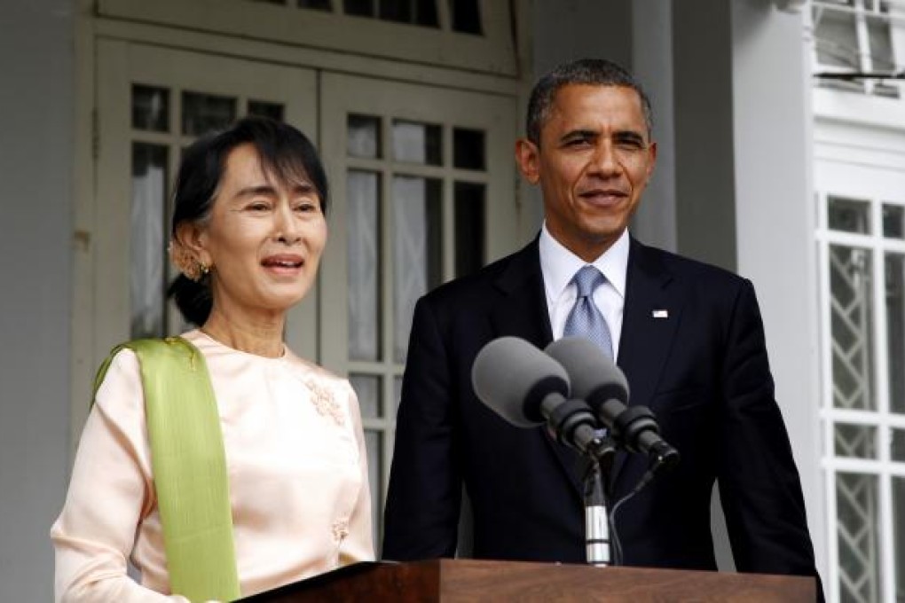 President Barack Obama with fellow Nobel Peace Prize laureate Aung San Suu Kyi at the home where she had long been under house arrest. Photo: Xinhua