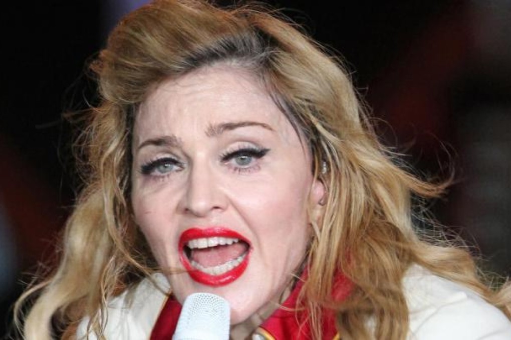A court in St Petersburg hears a US$10.5 million suit against Madonna.