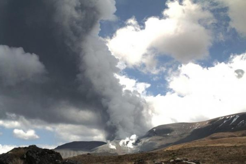 Dark ash billows from the volcano yesterday. Photo: AFP